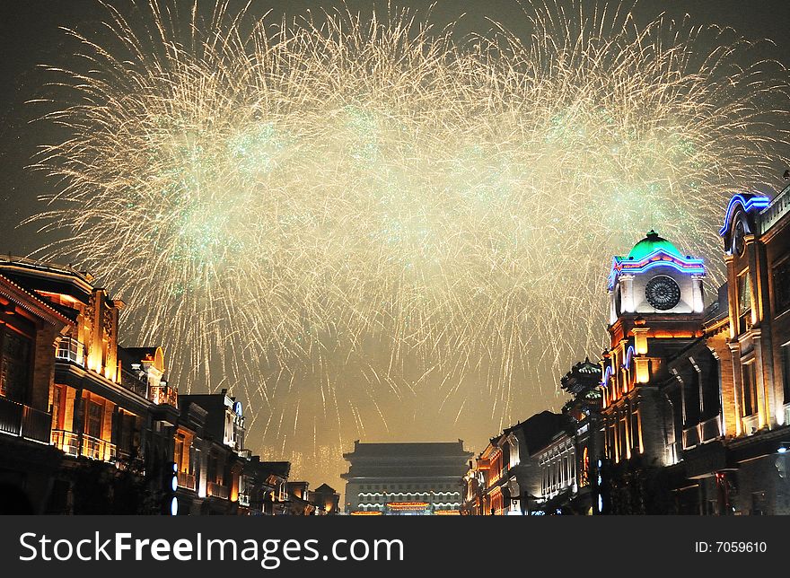 Night scene with fireworks over the ancient buildings