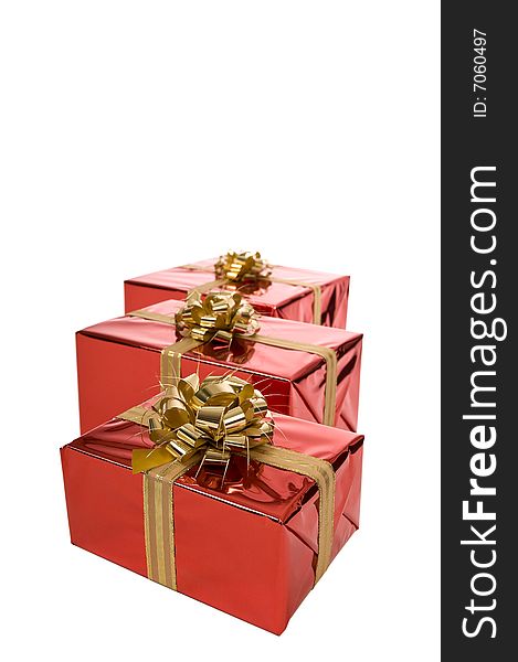 Group of three red Christmas presents isolated on white background