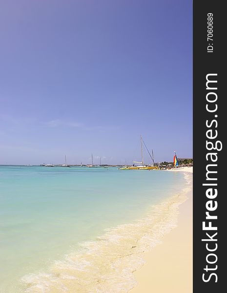 Sans and ocean on the Caribbean sea in Aruba island