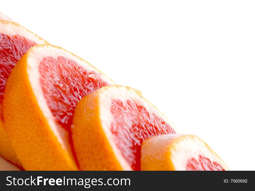 Citrus Fruits - pink sliced grapefruit also for background. Citrus Fruits - pink sliced grapefruit also for background