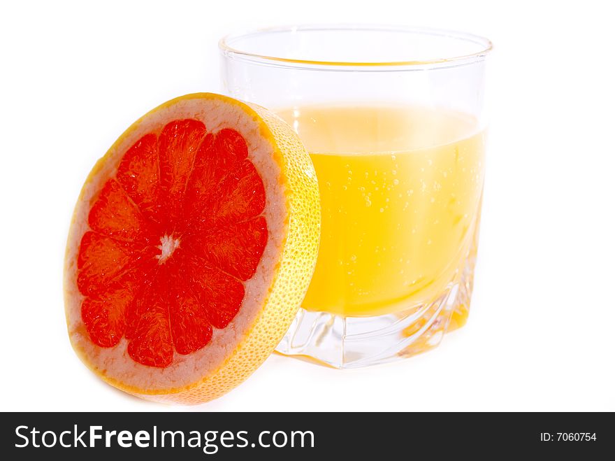 Slice of pink grapefruit and juice