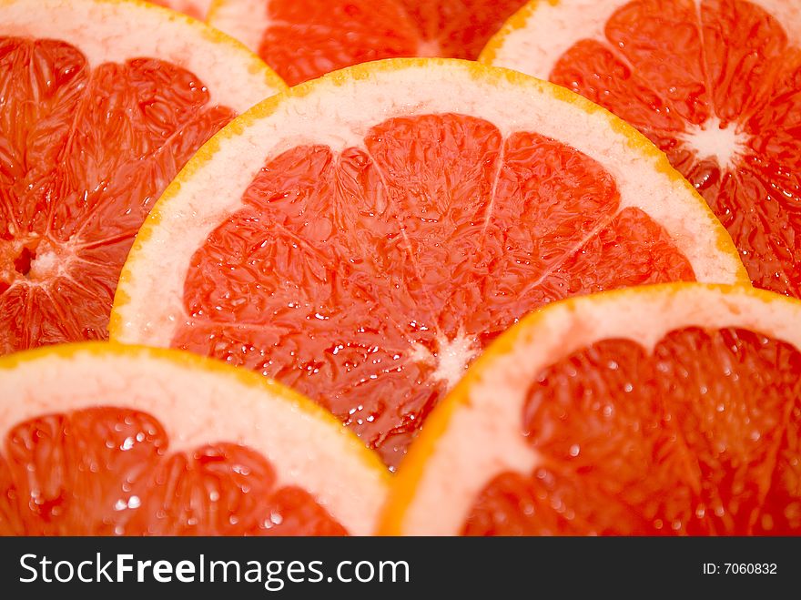 Citrus Fruits - pink grapefruits also for background