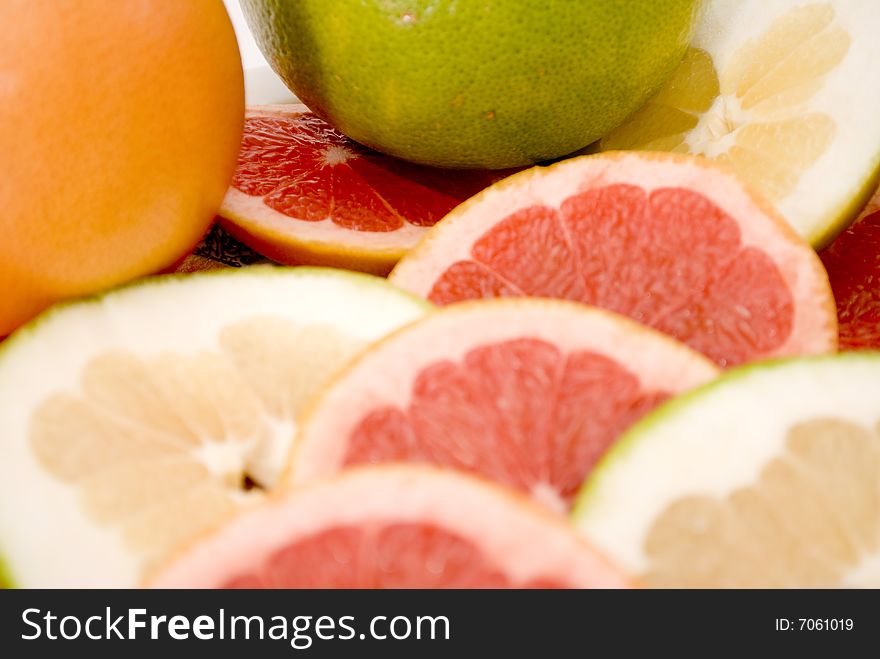 Citrus Fruits - pink and green grapefruits