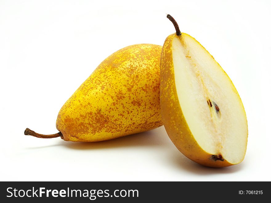 The ripe pears isolated on the white. The ripe pears isolated on the white