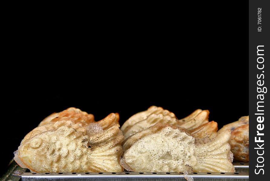 Two Rows of three goldfish pastries stuffed with creamy sweet bean curd