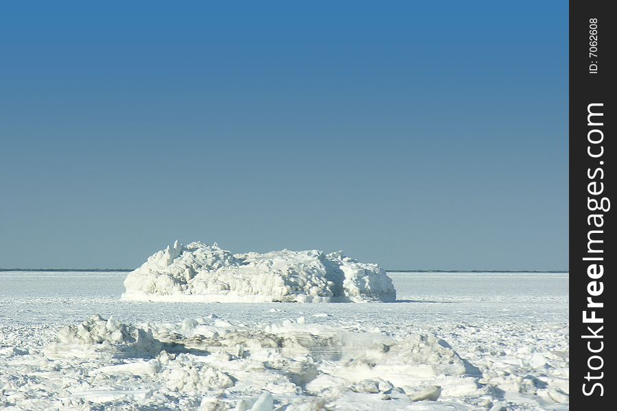 March frozen river in Gaspésie, Québec. Whith frozen mass of water