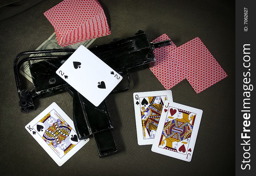 Casino background with money, gun and cards