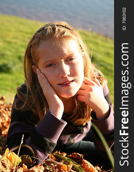 Autumn Girl In Grass