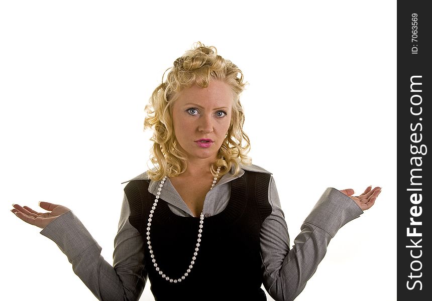 A blonde woman shrugging with her hands up as if saying I don't know or weighing options. A blonde woman shrugging with her hands up as if saying I don't know or weighing options