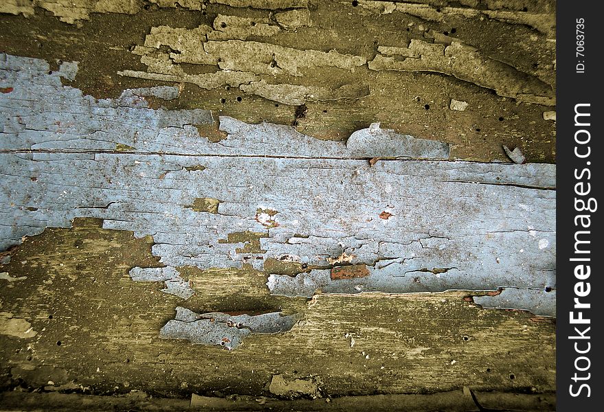 Old cracked paint on wood background. Old cracked paint on wood background