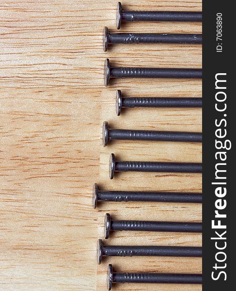 Macro of Nails on Wood