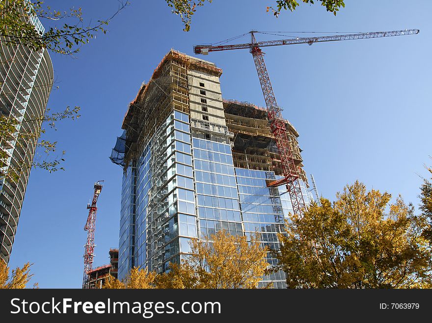 Skyscraper being Constructed with Residential, Retail and Office Space. Skyscraper being Constructed with Residential, Retail and Office Space