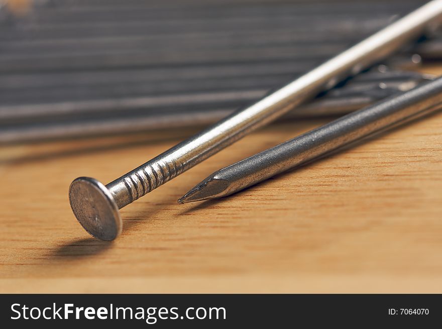 Macro of Nails on a Wood Background. Macro of Nails on a Wood Background.