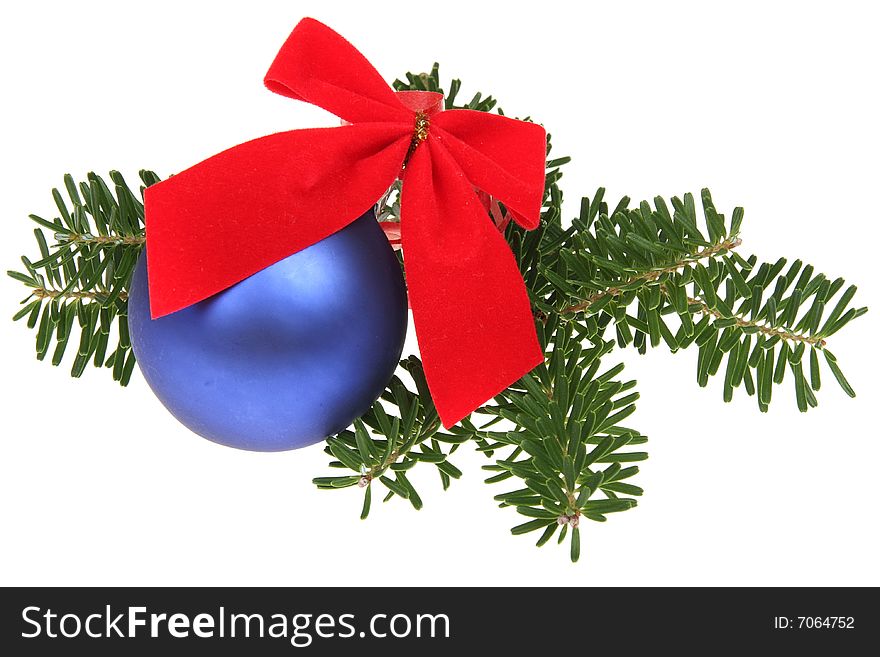 Christmas balls with ribbons and branch on white background
