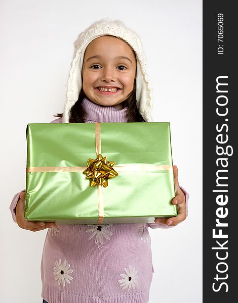 Little smiling girl with christmas gift. Little smiling girl with christmas gift