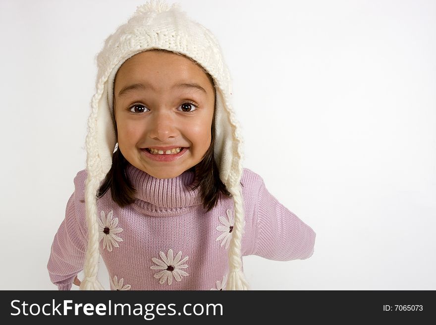 Smiling little girl on white background looking directly into camera. Smiling little girl on white background looking directly into camera