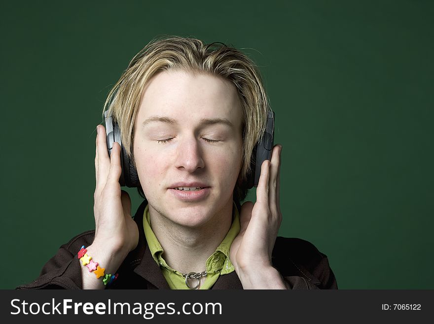 Caucasian man enjoying music with headphones