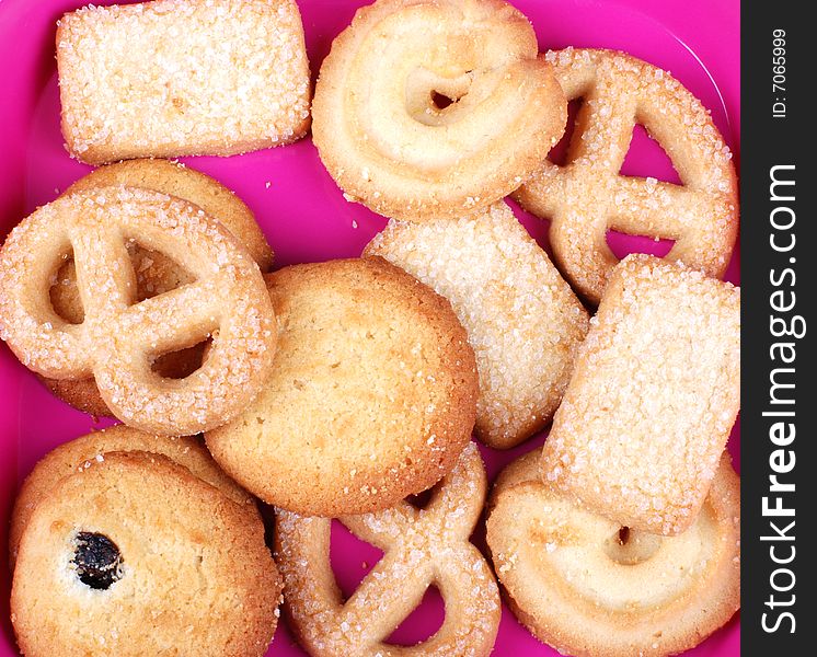 Stack of cookies in pink plate