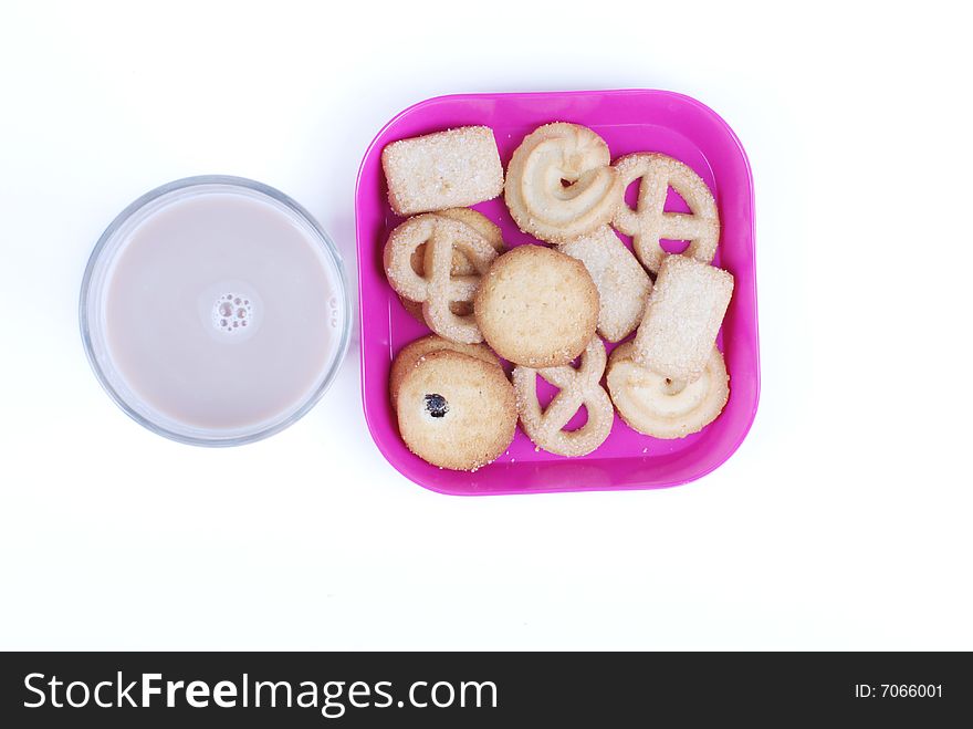 A plate of cookies and cup of milk-chocolate on white background. A plate of cookies and cup of milk-chocolate on white background