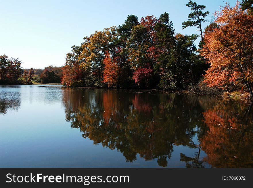A lake scene during the fall of the year. A lake scene during the fall of the year