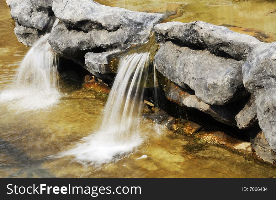 Waterfalls and the rock, waterfall in the creek