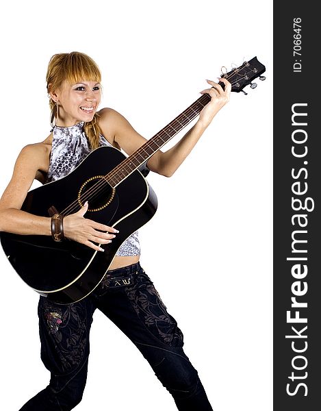 Pretty, blonde girl holding guitar, happy, laughing and playing music. Pretty, blonde girl holding guitar, happy, laughing and playing music.
