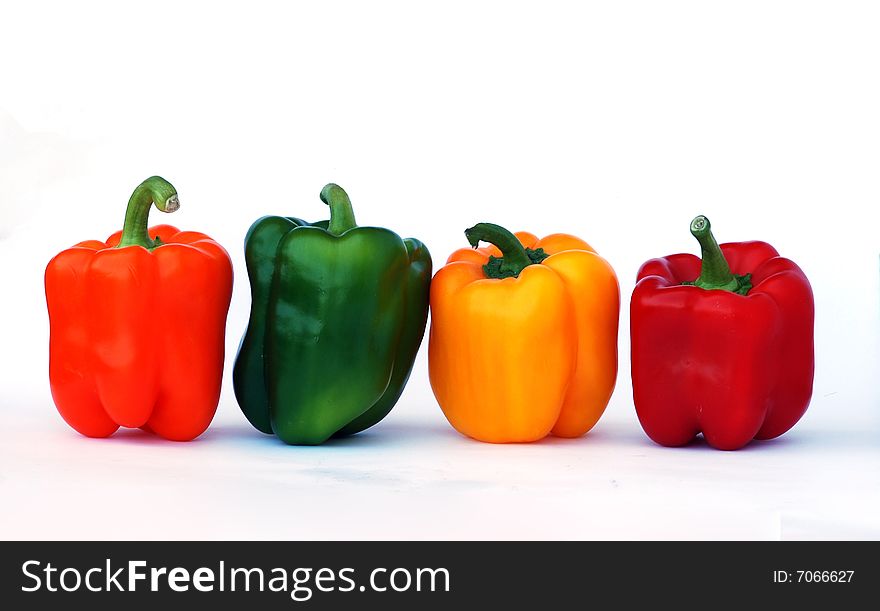 Colorful sweet peppers  isolated on white landscape
