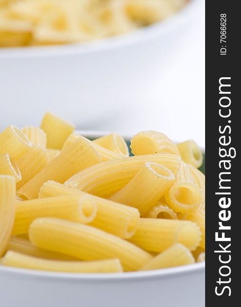 Fresh uncooked raw italian pasta isolated over white