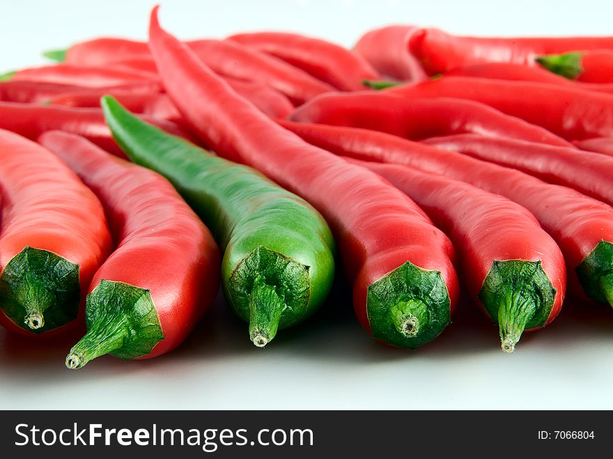 Colorful hot chili peppers. Red and green. Colorful hot chili peppers. Red and green