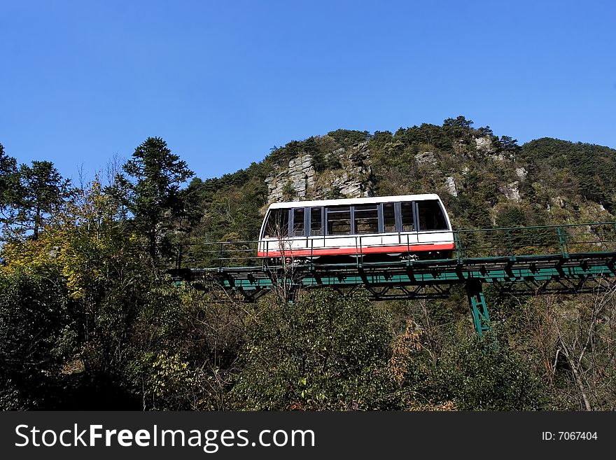 The sightseeing train in the national forest park. The sightseeing train in the national forest park.