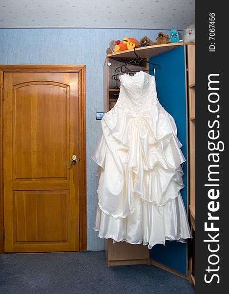 Wedding dress in a bride room. Wedding dress in a bride room