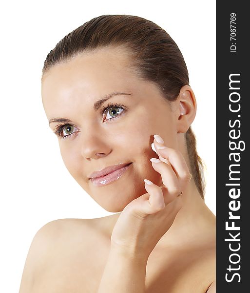 Portrait of young  smiling beautiful woman applying creme. Portrait of young  smiling beautiful woman applying creme