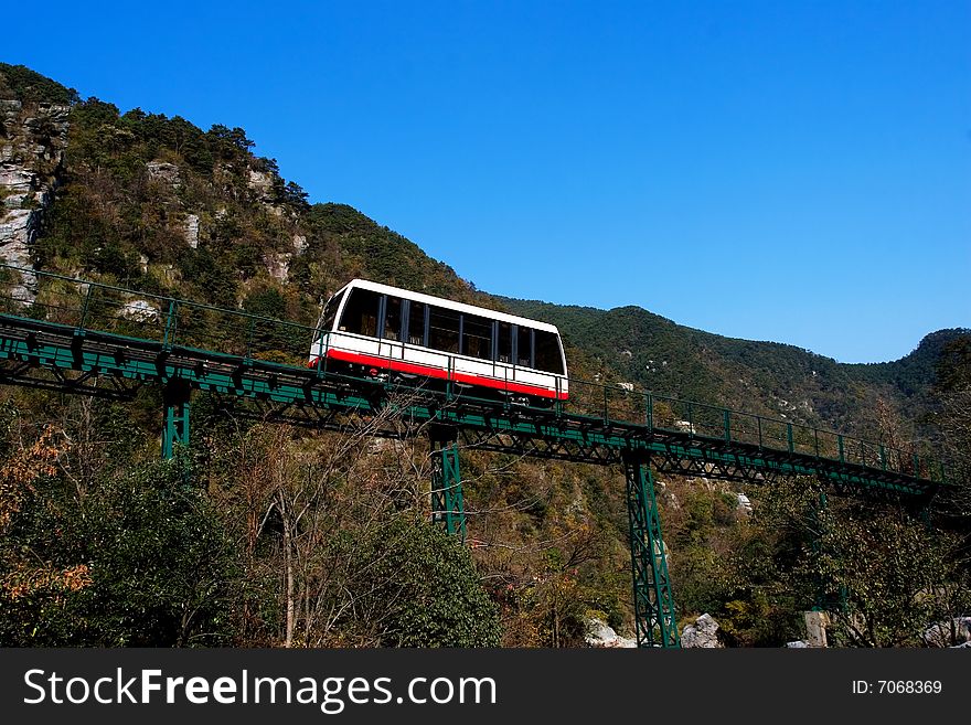 The sightseeing train in the national forest park. The sightseeing train in the national forest park.