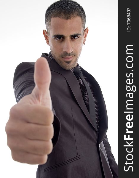 Man showing thumb up against white background