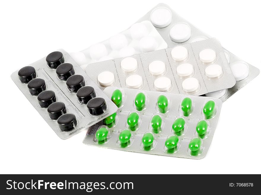 Several types of pills in their packages. Several types of pills in their packages