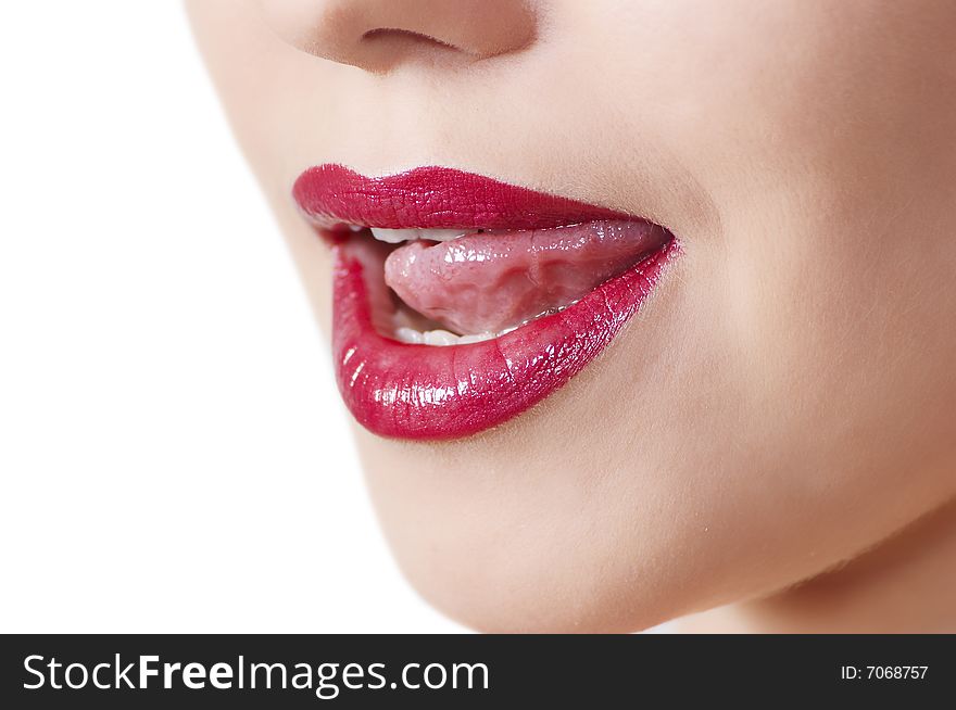 Beautiful woman leaking teeth with tongue close-up. Beautiful woman leaking teeth with tongue close-up