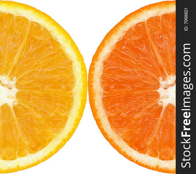 A perfectly round coloured orange slice isolated on a white background. A perfectly round coloured orange slice isolated on a white background
