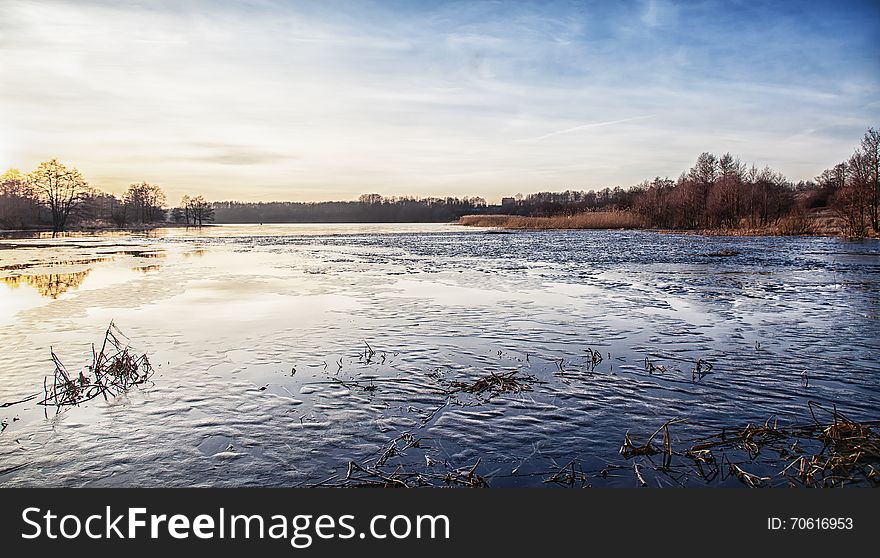 Winter icy lake at sunset. Winter icy lake at sunset