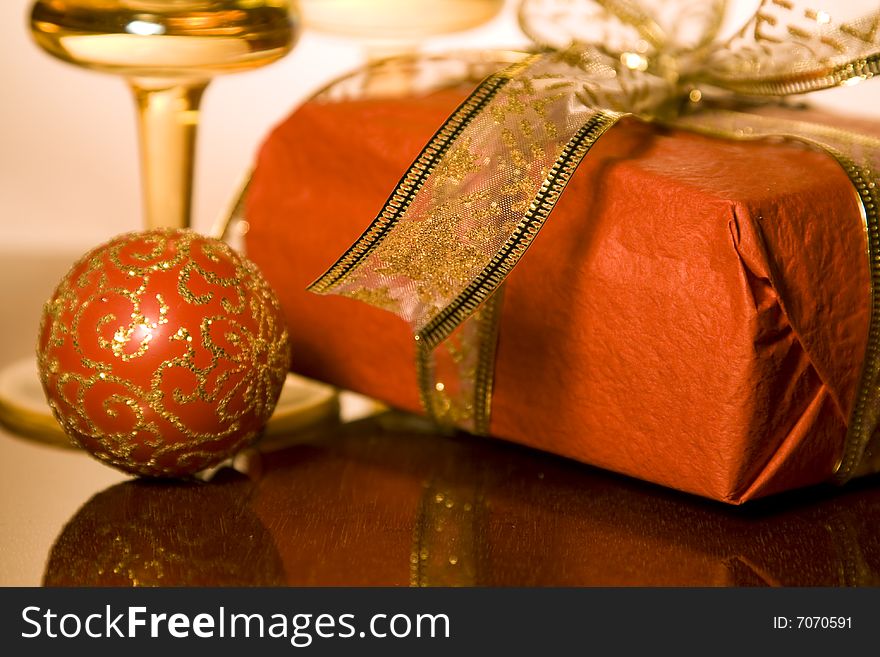 Christmas gifts and decoration on reflective background