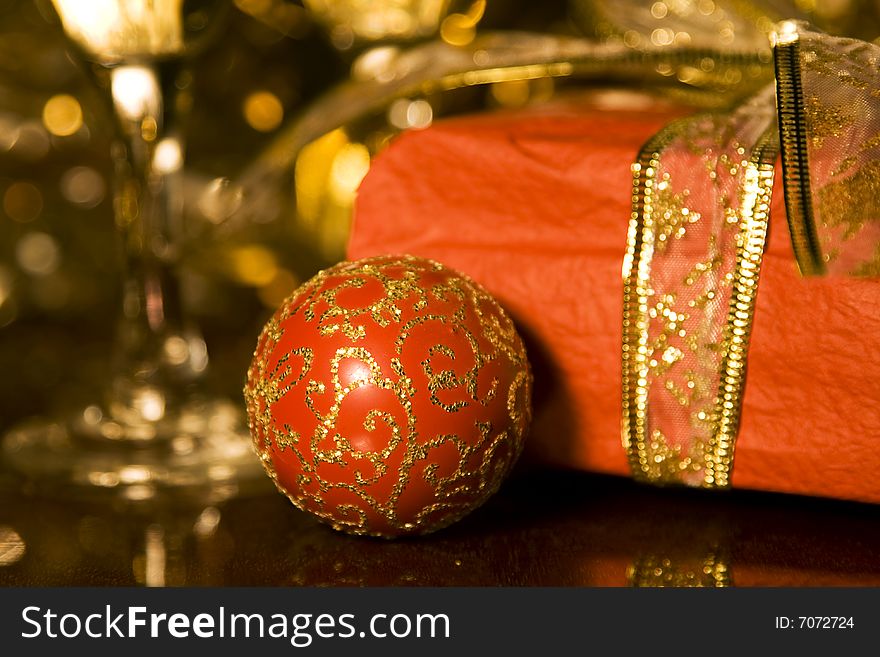 Christmas gifts and decoration on reflective background