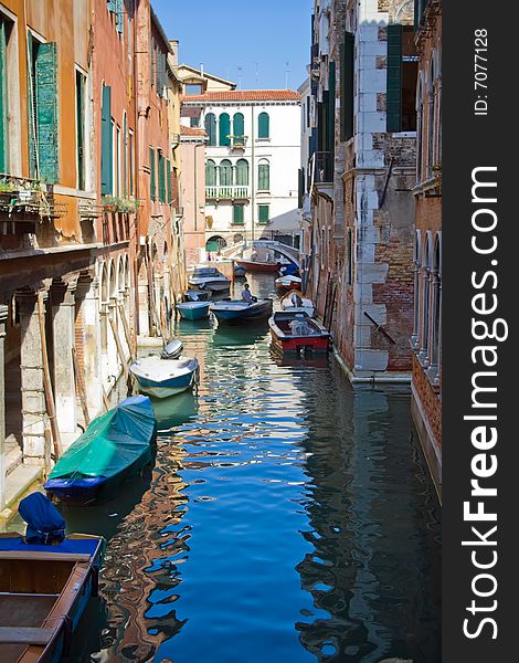 A typical canal in Venice and a bridge. A typical canal in Venice and a bridge