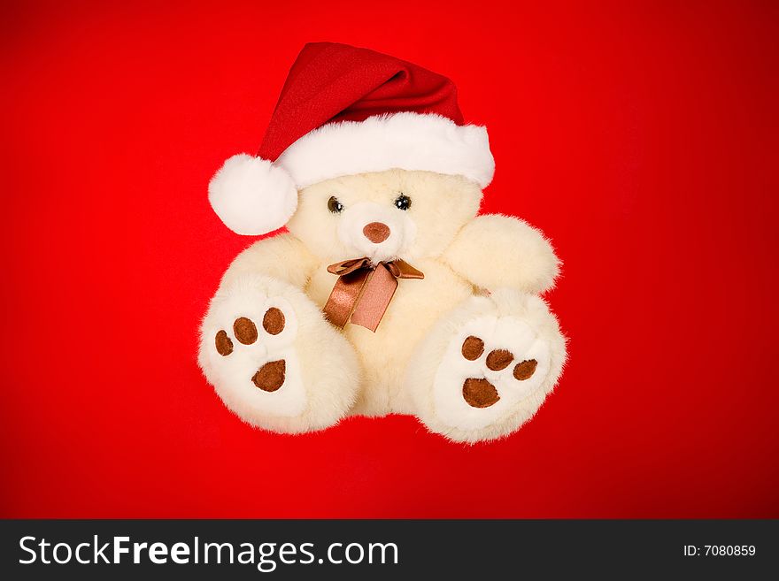Teddy bear on isolated over red background. Teddy bear on isolated over red background