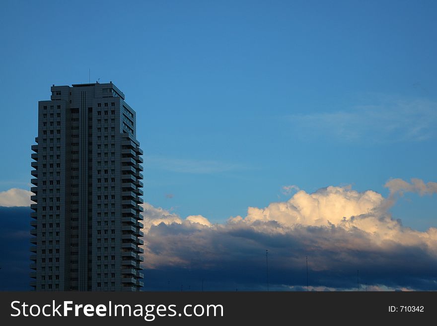 Modern building silhouette with a blue sky. Modern building silhouette with a blue sky