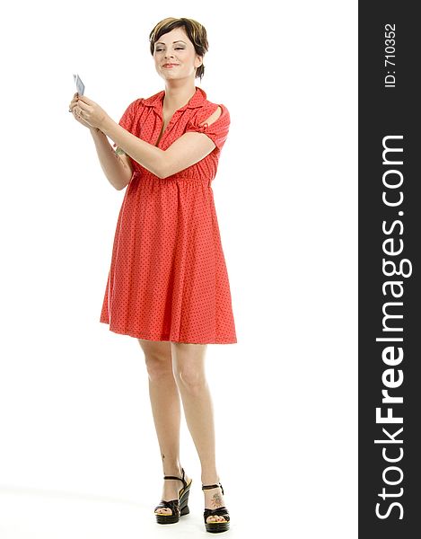 young actress with tattoos, a red girlish dress, poses different postures and expressions for an audition, with playing cards, over a white background. young actress with tattoos, a red girlish dress, poses different postures and expressions for an audition, with playing cards, over a white background