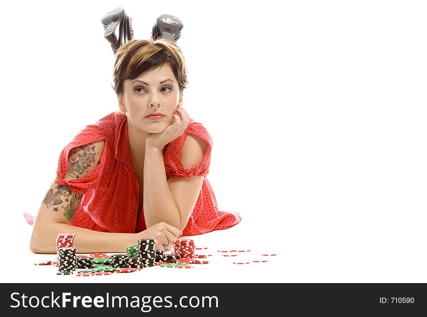 young actress with tattoos, a red girlish dress, poses different postures and expressions for an audition, with tokens in front of her, down on the white floor. young actress with tattoos, a red girlish dress, poses different postures and expressions for an audition, with tokens in front of her, down on the white floor