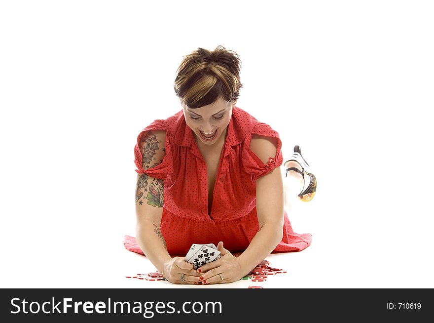 young actress with tattoos, a red girlish dress, poses different postures and expressions for an audition, holding some cards, laying on the white floor. young actress with tattoos, a red girlish dress, poses different postures and expressions for an audition, holding some cards, laying on the white floor