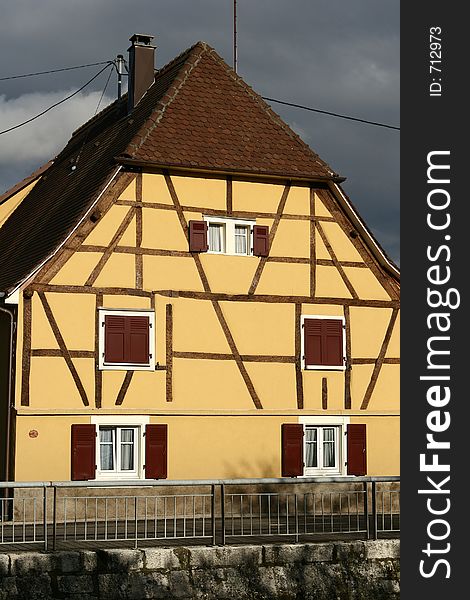 In the street of a alsacian villlage in the summer, half timbered traditional house. In the street of a alsacian villlage in the summer, half timbered traditional house