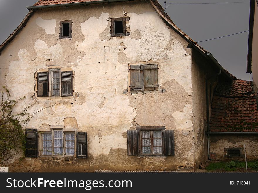 In the street of a alsacian villlage in the summer, very old house. In the street of a alsacian villlage in the summer, very old house