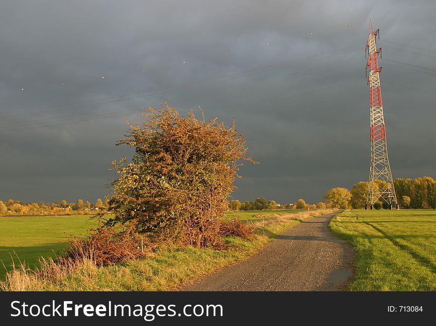 Rural landscape with power pole just before a thunderstorm