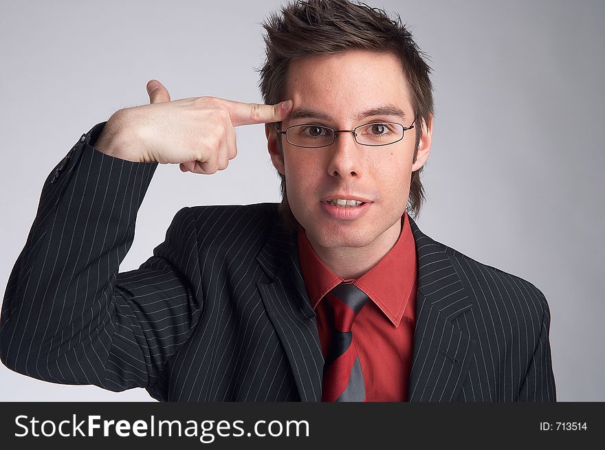 Businessman shows shows thinking sign